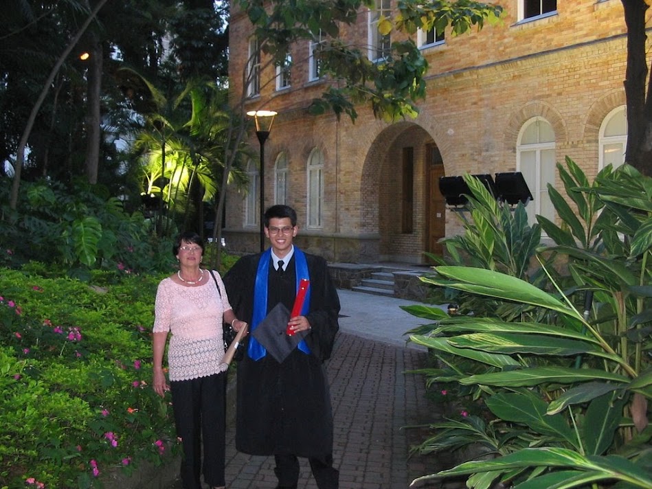 Information Systems Graduate at Mackenzie, 2005, next to his mother.