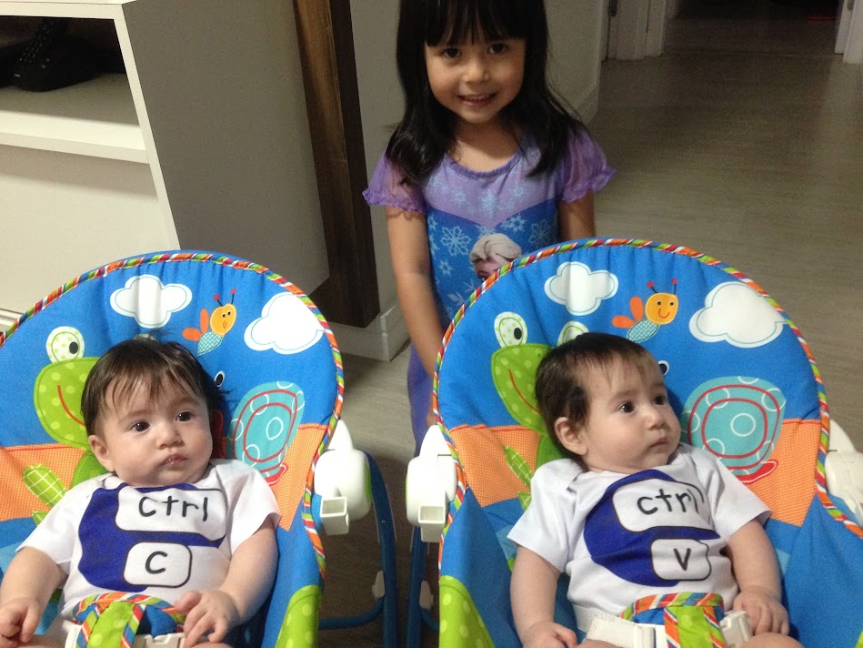 Newborn twins with Ctrl+C and Ctrl+V bodies alongside their sister, 2016.
